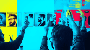 A group of men and women updating a colorful