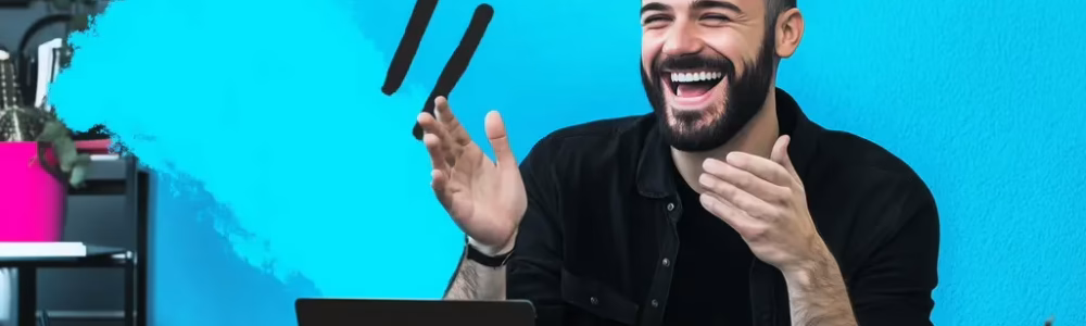 A team leader clapping as a colleague hits a perform